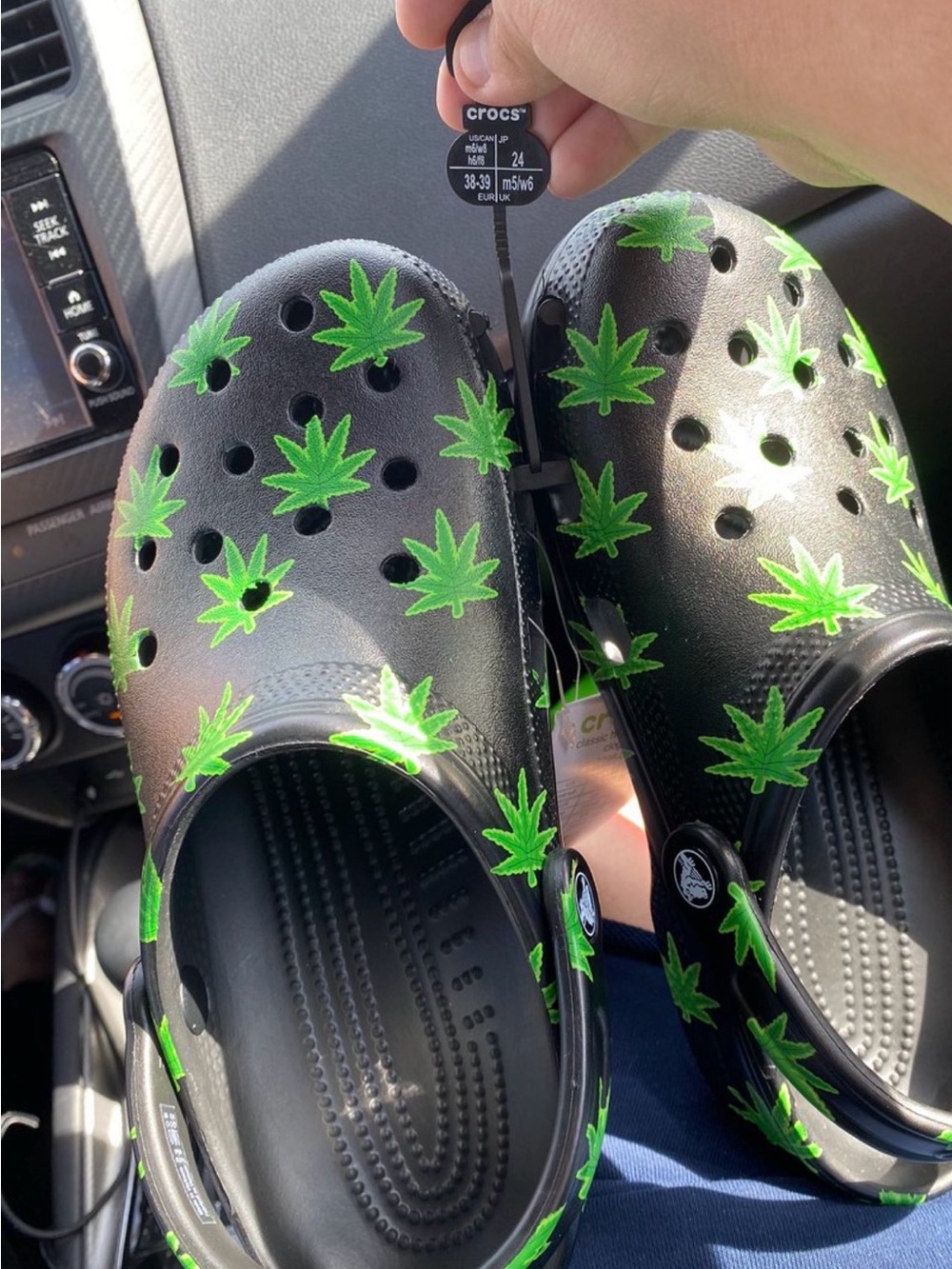 CROCS Black Classic Clogs with Green Leaf Print